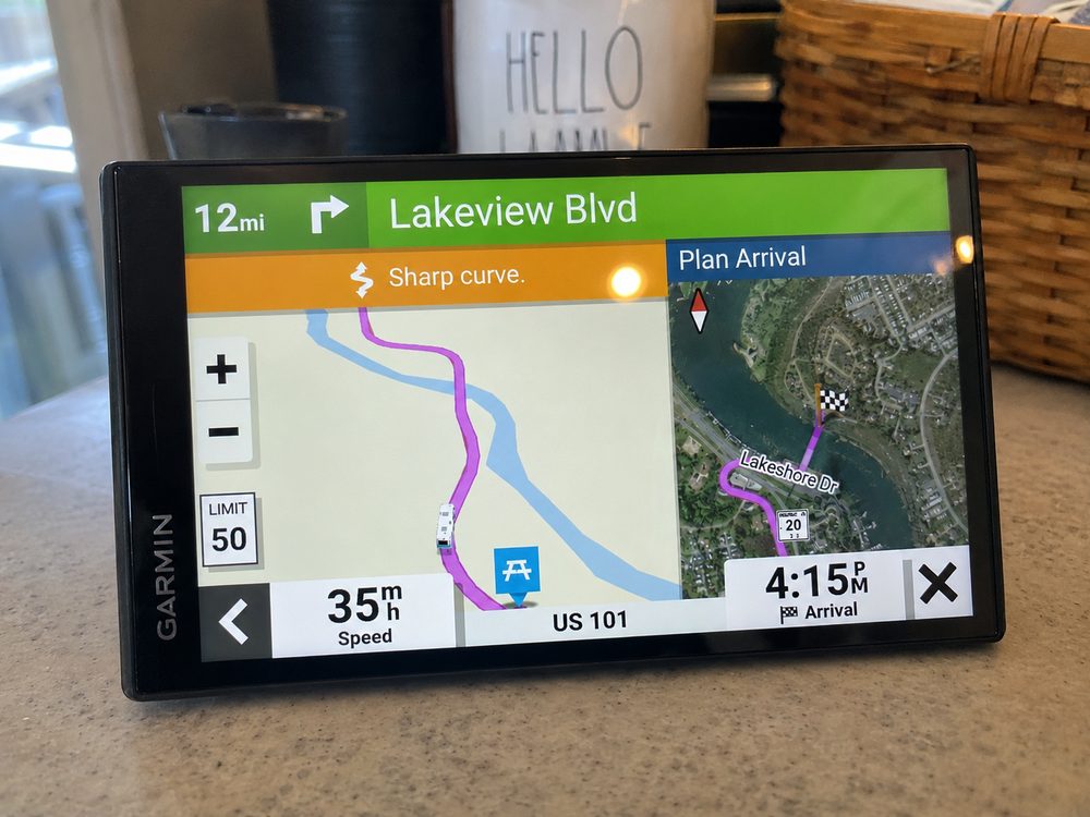 Garmin Camper 795 on-route with a sharp-bend warning and Plan Arrival preview